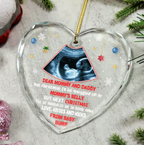 Custom Photo This Christmas I'll Be Snuggled Up Newborn Baby - Personalized Heart Shaped Glass Ornament